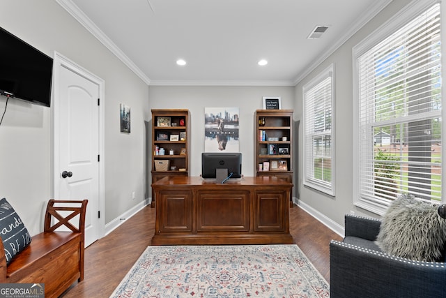 office area with dark wood-type flooring and crown molding