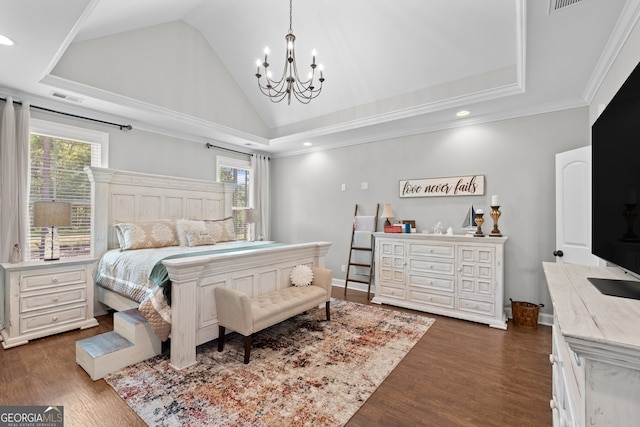 bedroom featuring a towering ceiling, ornamental molding, a notable chandelier, and dark wood-type flooring