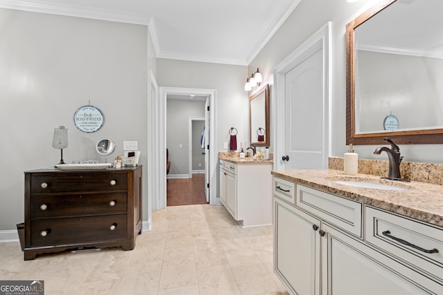 bathroom with vanity and crown molding