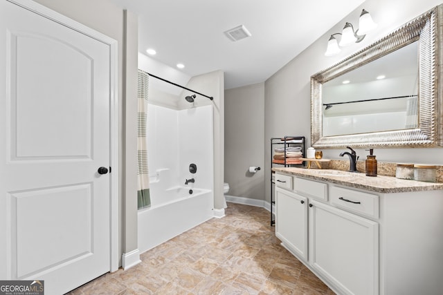 full bathroom featuring toilet, shower / tub combo, and vanity