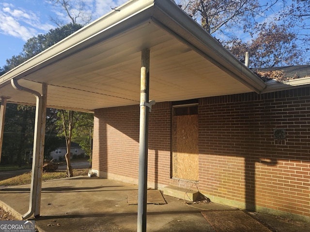 view of patio / terrace featuring a carport