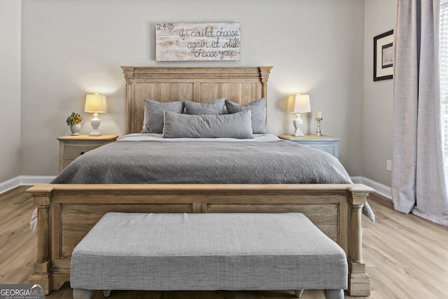 bedroom featuring light hardwood / wood-style floors
