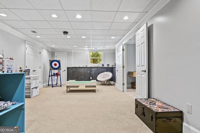 game room with a drop ceiling and light colored carpet