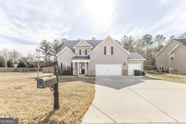 front of property featuring a porch and a garage