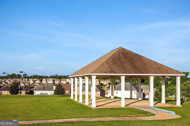 view of community featuring a gazebo and a yard