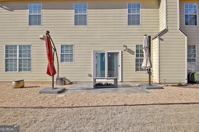 rear view of house with a patio