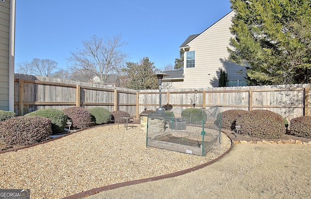 view of yard with a patio and a fenced backyard