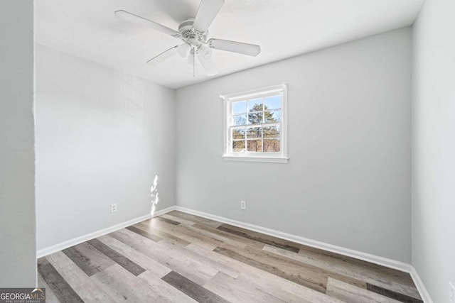 unfurnished room featuring light hardwood / wood-style floors and ceiling fan