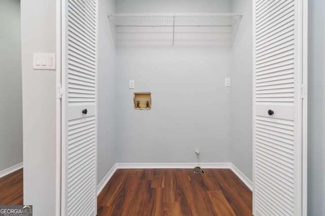 washroom with washer hookup and dark hardwood / wood-style floors