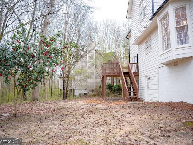 view of yard with a deck