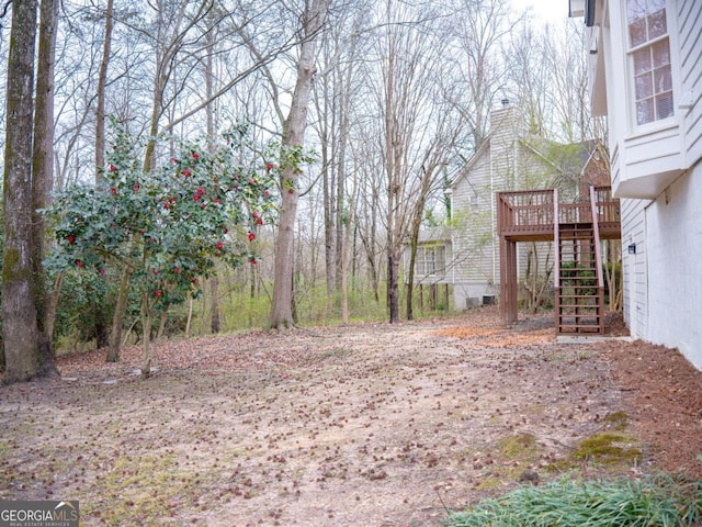 view of yard with a deck