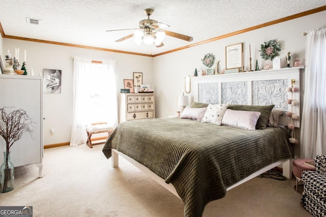 carpeted bedroom featuring ceiling fan, crown molding, and a textured ceiling