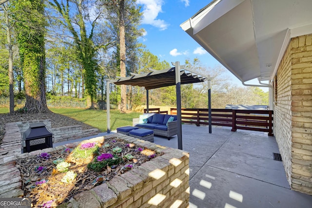 view of patio / terrace featuring an outdoor living space and a pergola