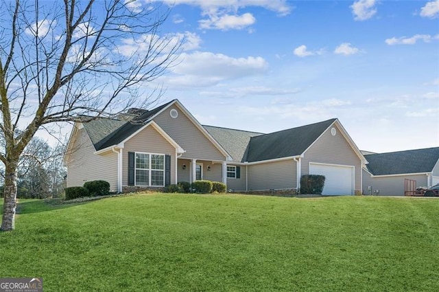 ranch-style house with a front yard and a garage