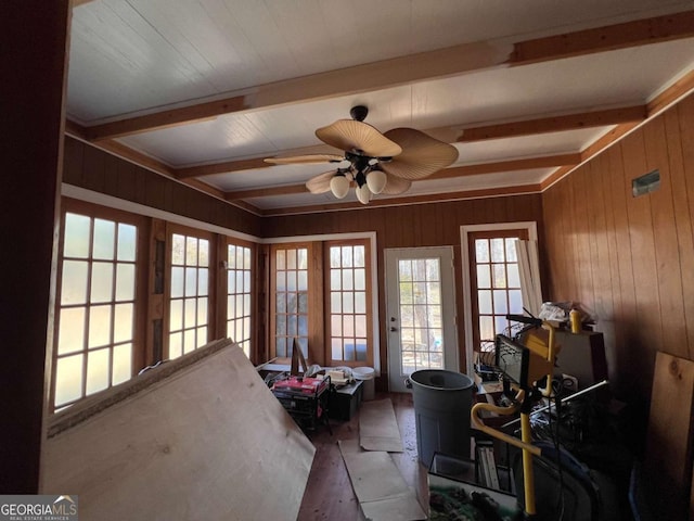 sunroom / solarium featuring ceiling fan