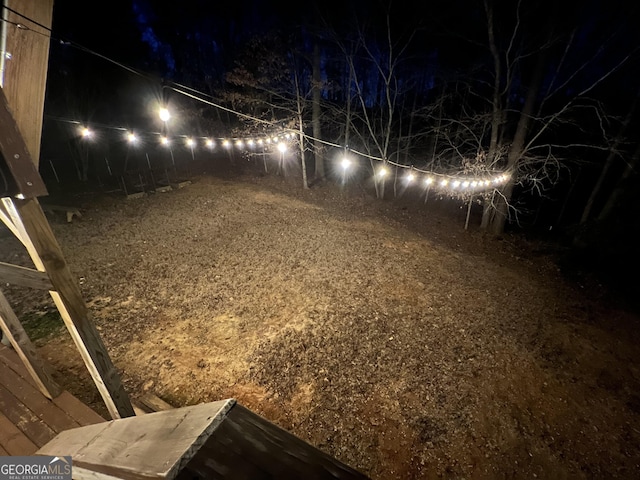 view of yard at night