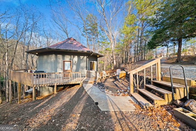 view of front of house with a deck