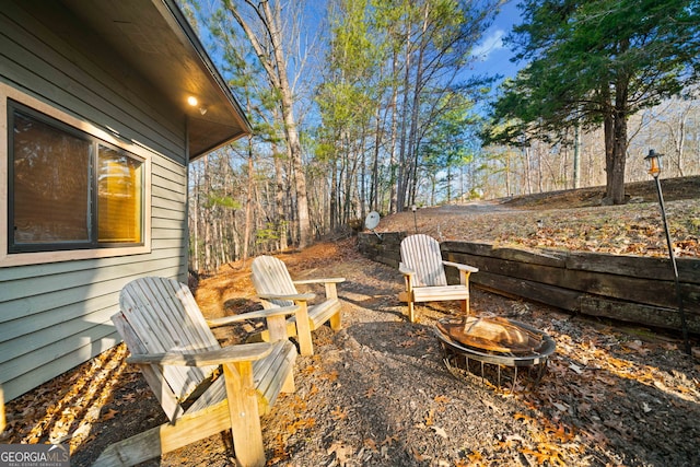 view of patio featuring an outdoor fire pit