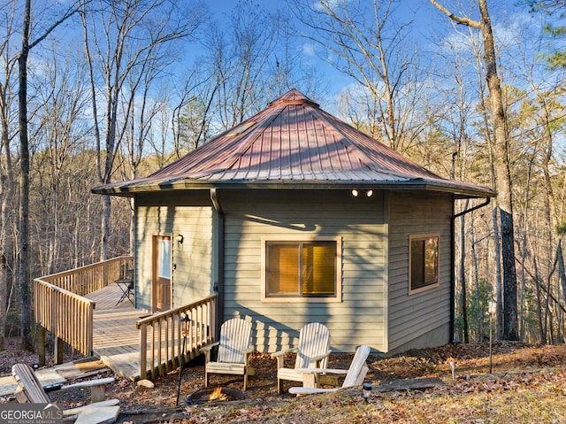 view of side of home featuring a deck