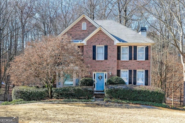 view of front facade with a front yard