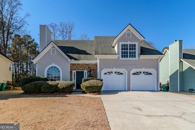 view of front property with a garage