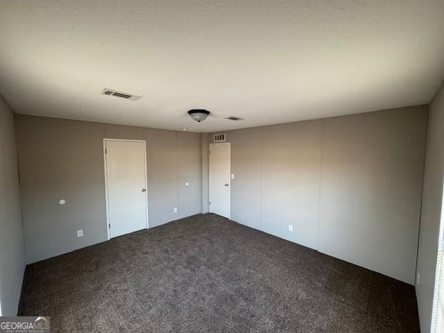 spare room with carpet flooring