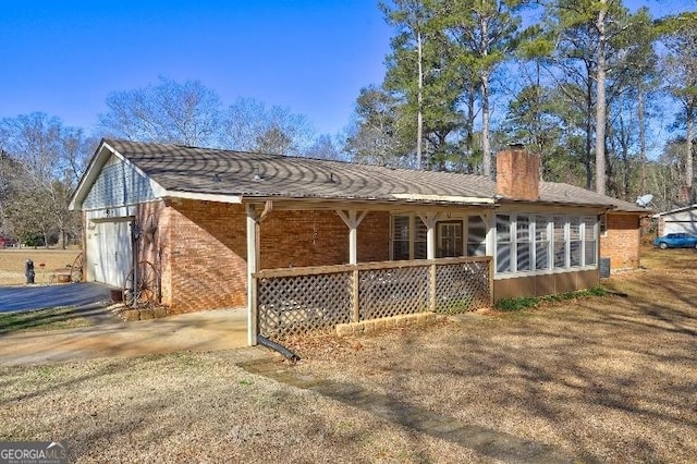 exterior space with a garage