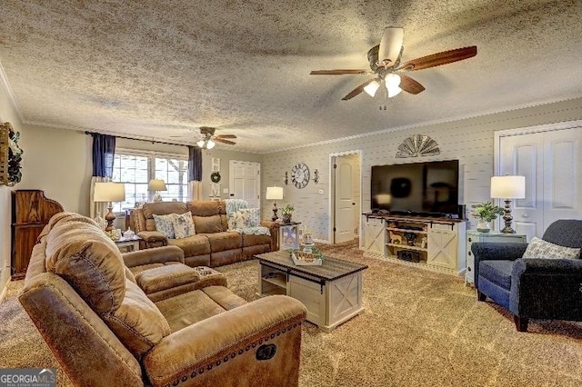 living room with a textured ceiling, ornamental molding, and light carpet