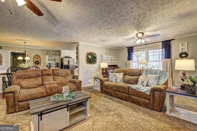 carpeted living room with a textured ceiling, ceiling fan, and crown molding