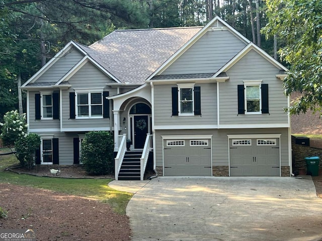 bi-level home featuring a garage