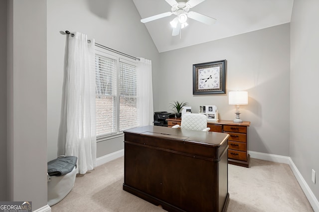 carpeted home office featuring ceiling fan and lofted ceiling