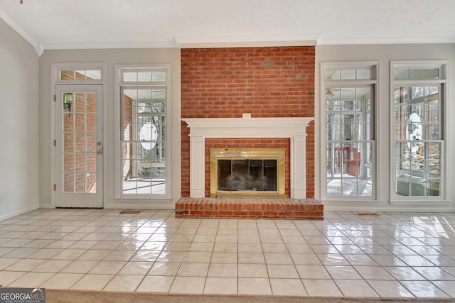 unfurnished living room featuring a fireplace, light tile patterned flooring, and crown molding