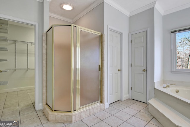 bathroom with a textured ceiling, independent shower and bath, tile patterned flooring, and ornamental molding