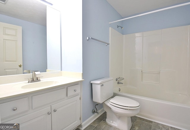 full bathroom featuring toilet, vanity, and bathtub / shower combination