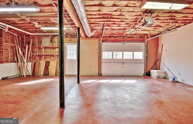 garage featuring a garage door opener