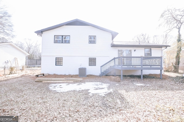 rear view of property with a deck