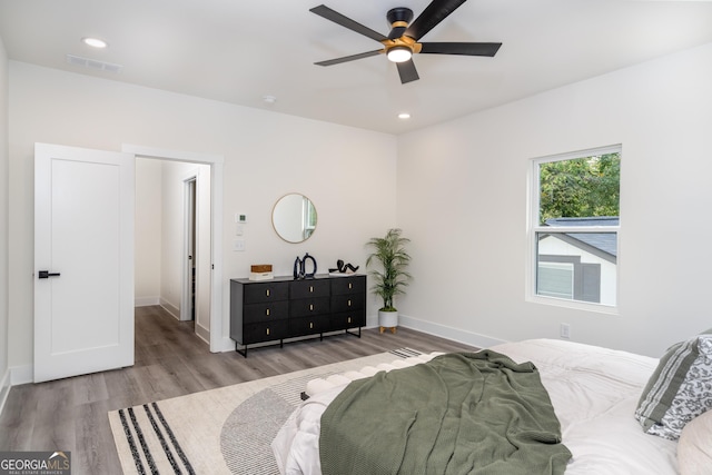 bedroom featuring ceiling fan and light wood-type flooring