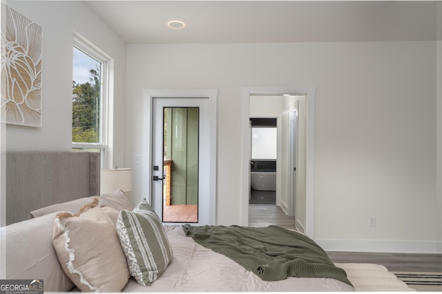 bedroom featuring hardwood / wood-style floors