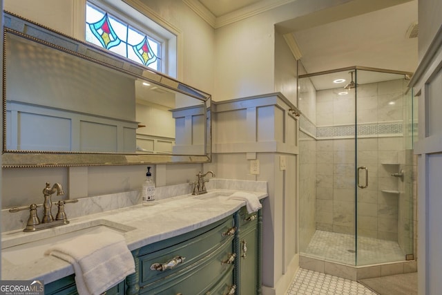 bathroom with ornamental molding, tile patterned floors, walk in shower, and vanity