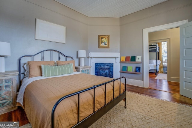 bedroom featuring hardwood / wood-style flooring