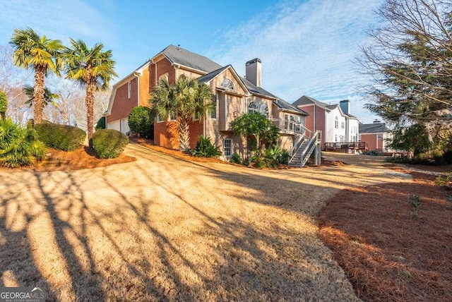 view of property exterior featuring a garage