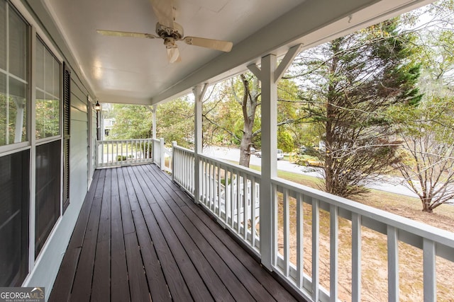 wooden deck with ceiling fan