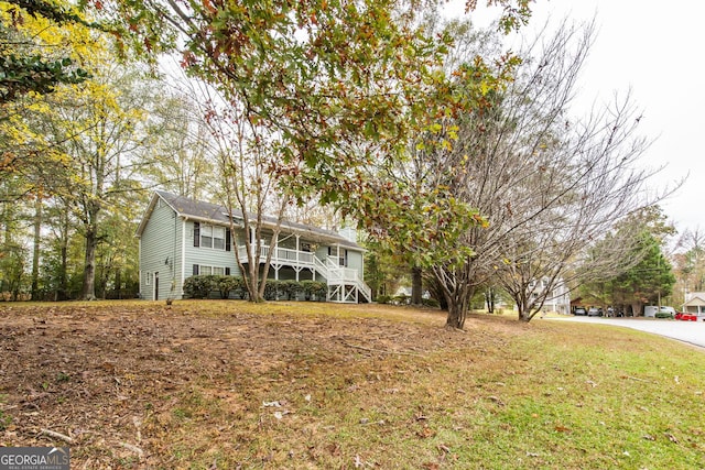 view of front of home with a front yard