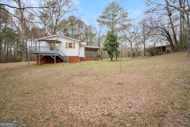 view of yard featuring a deck