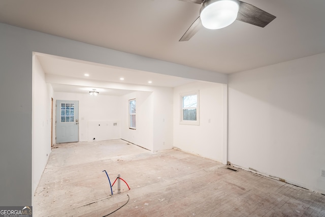 unfurnished room featuring ceiling fan