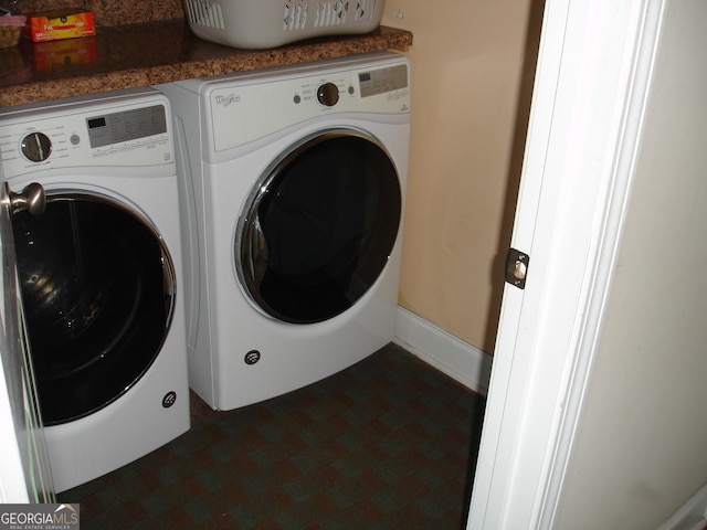 washroom featuring laundry area and independent washer and dryer