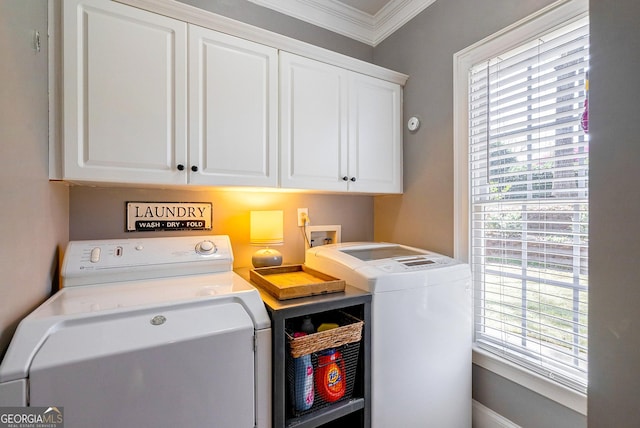 1231 Scarlet Oak Cir, Athens, GA 30606 - laundry room with washer and clothes dryer, ornamental molding, healthy amount of natural light, and cabinet space