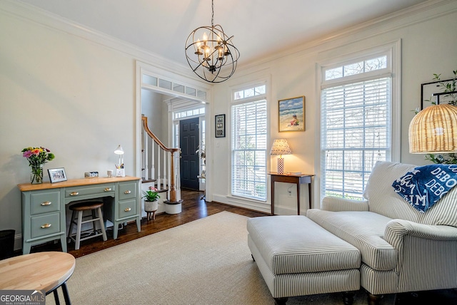 1231 Scarlet Oak Cir, Athens, GA 30606 - living room with a chandelier, crown molding, and dark wood-style flooring