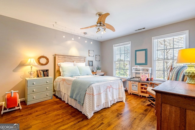 1231 Scarlet Oak Cir, Athens, GA 30606 - bedroom with wood finished floors, an office area, and a ceiling fan