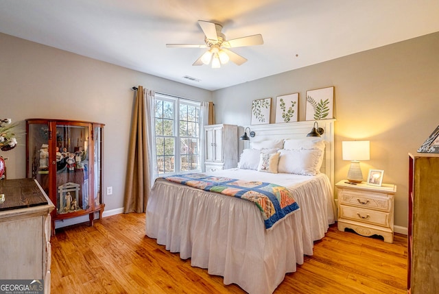 1231 Scarlet Oak Cir, Athens, GA 30606 - bedroom featuring light wood finished floors, baseboards, and a ceiling fan